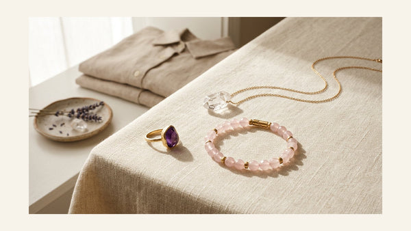 Three-piece crystal jewelry capsule wardrobe with a rose quartz bracelet and clear quartz pendant